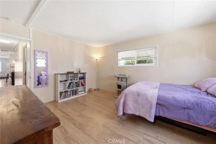 Another view of the primary bedroom.