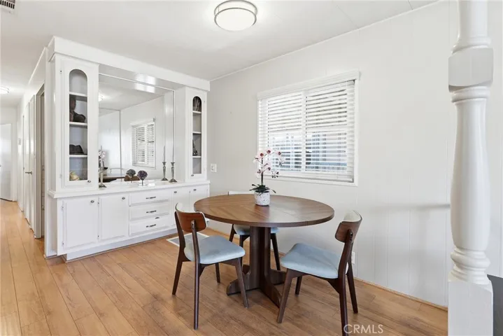 Spacious dining area with ample seating and an abundance of natural light.