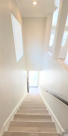 Stairs down to the front door