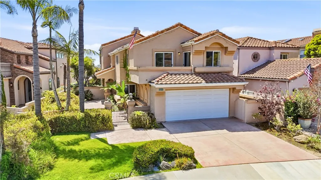 Front of the house with full driveway
