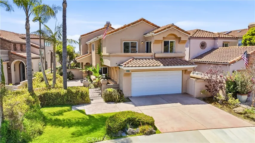 Front of the house with full driveway
