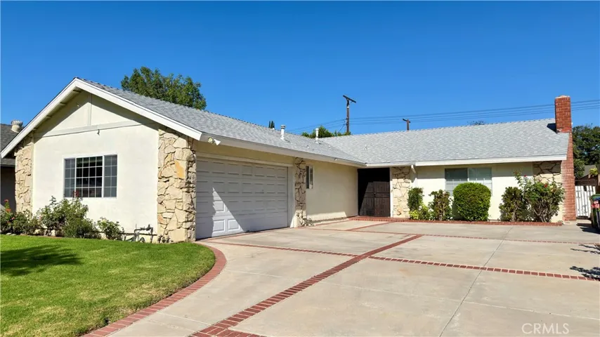 Driveway leading to Front Entry and Garage Access