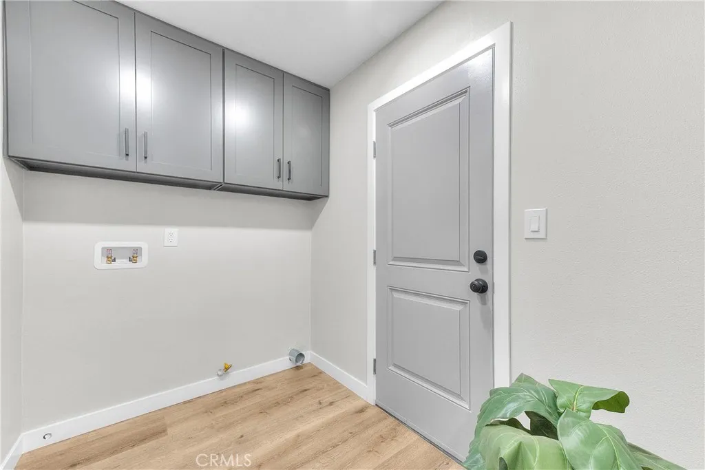 Laundry Room w/access to Backyard.