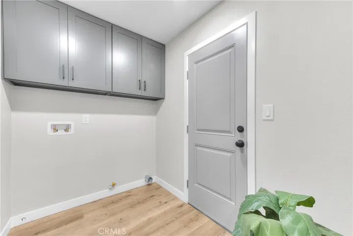 Laundry Room w/access to Backyard.