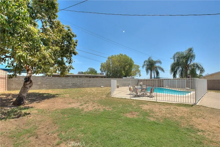 Backyard large grassy Area.