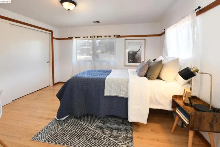 Hardwood flooring extending throughout the room