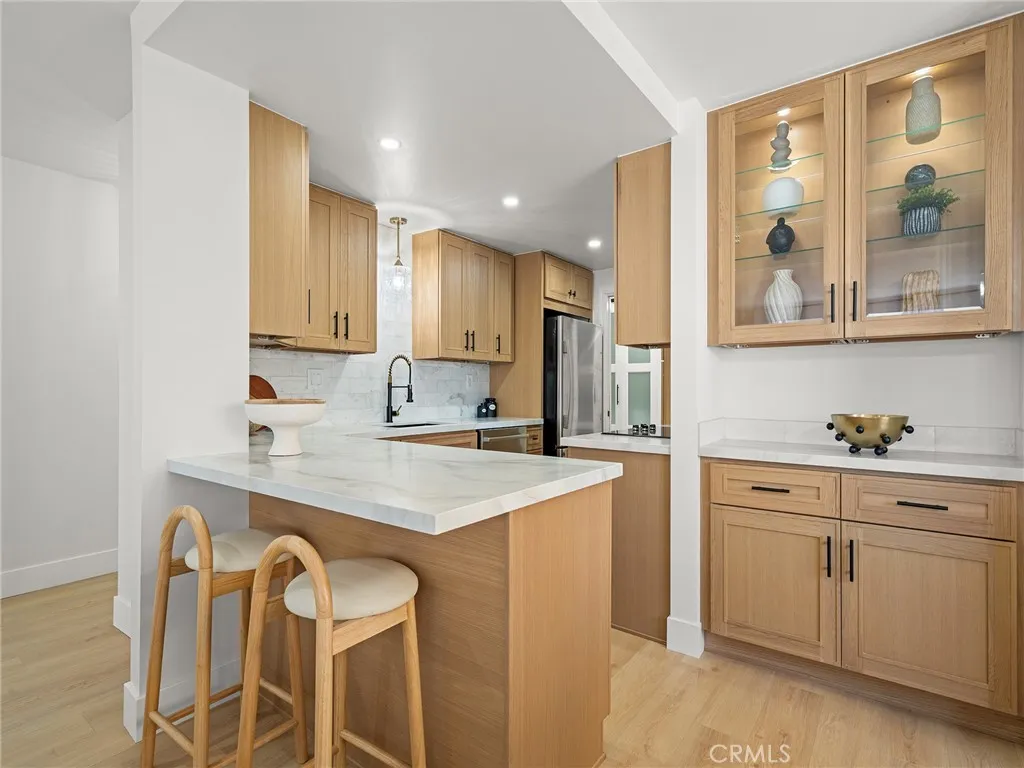 The kitchen bar for those on the go meals or the conversations we all have with guests or family while cooking.