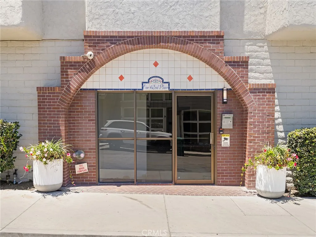 A well kept and secure street side entrance with access intercom to the residents cell phones. Enter the lobby to the elevator or hop up the convenient stairs to your home.