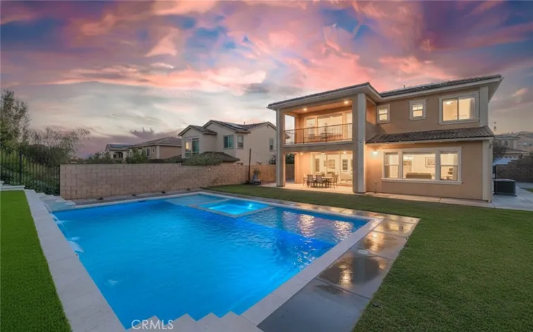 Dramatic backyard setting with sparkling pool and spa!