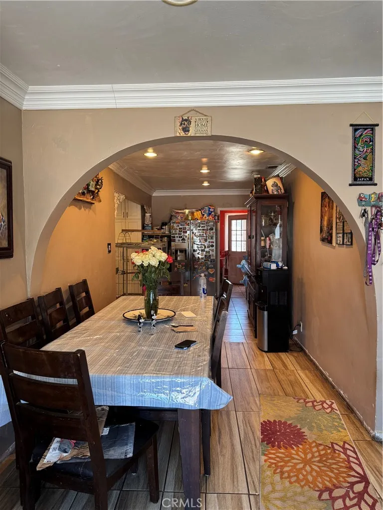 Dining room leading to kitchen and laundry room and 4th bedroom and 2nd. Bathroom