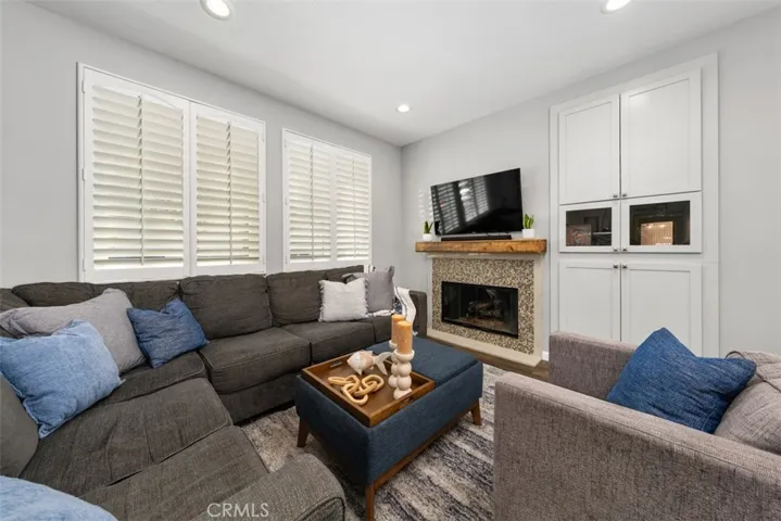 Built in multipurpose media cabinet next to your fireplace