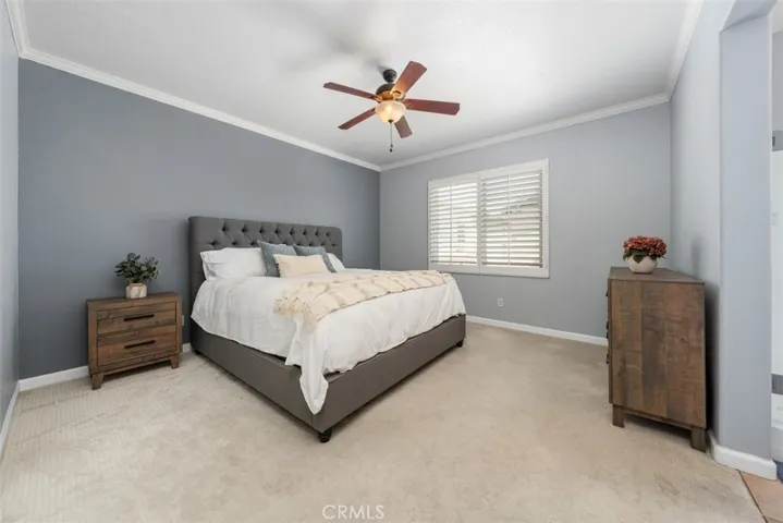 Spacious primary suite offering comfort, natural light, and a peaceful retreat.