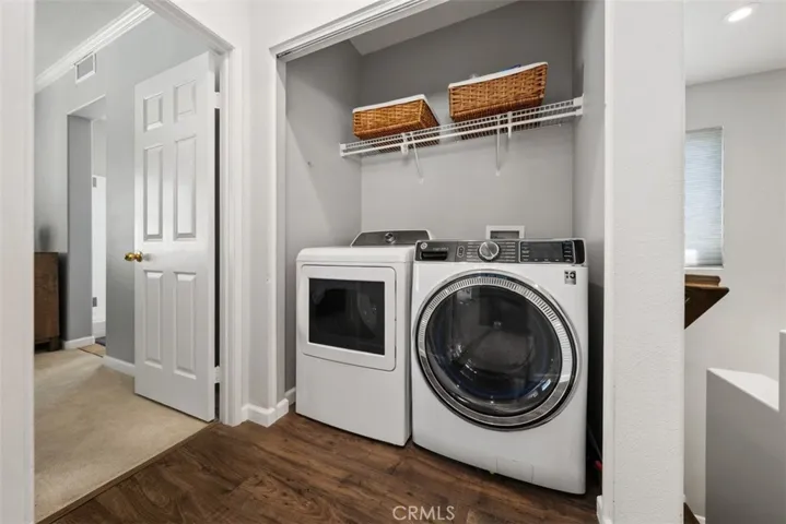 Convenient upstairs laundry room located near all bedrooms.