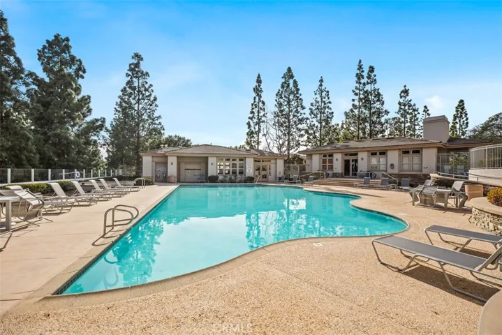 Resort-style pool with expansive lounge areas creates the perfect setting to enjoy Southern California living.
