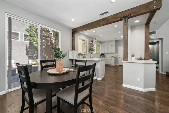Dining area conveniently located adjacent to the kitchen with direct access to the backyard patio.