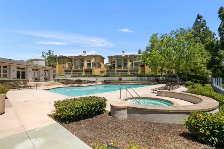 Relax and unwind at the community pool and spa, just one of Vista Plaza's outstanding amenities.