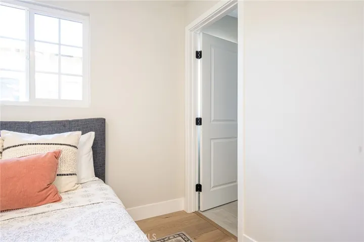 Downstairs primary bedroom with attached ensuite bathroom