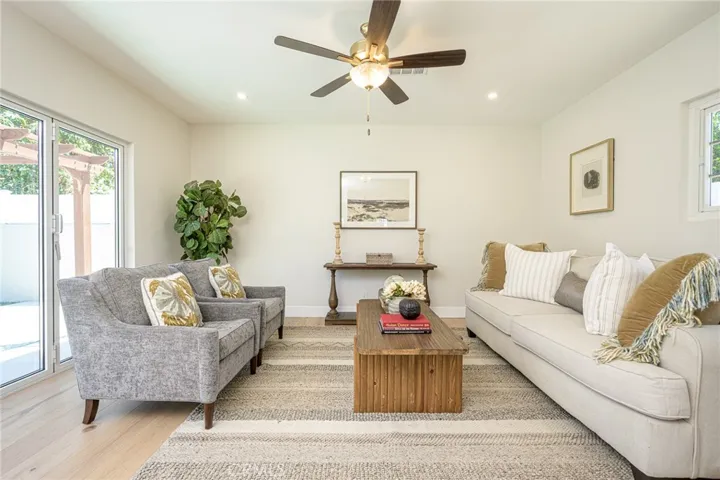 Back living area leads to backyard patio