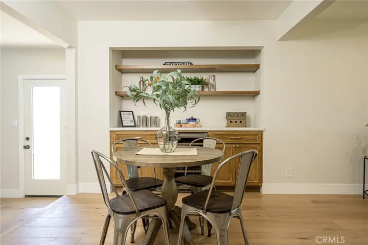 Versatile space perfect for casual dining with access to side yard area