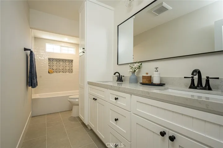 Hall bathroom with new double sink vanity