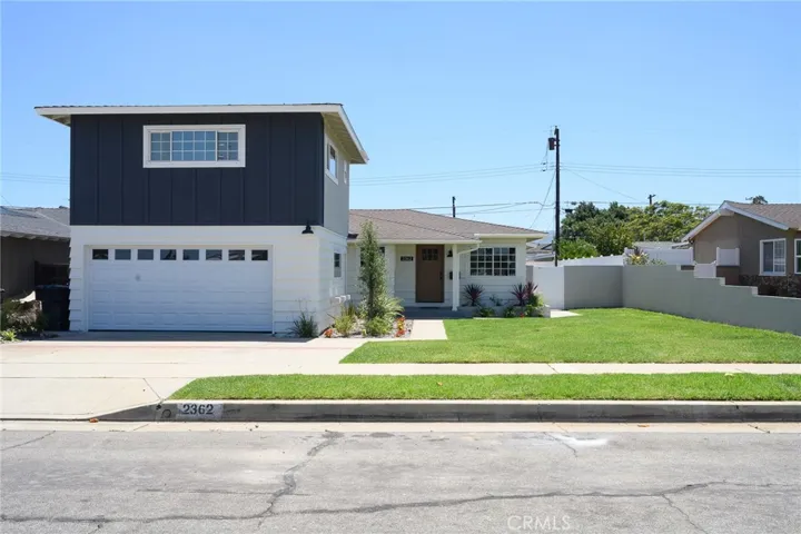 This GORGEOUS RENOVATED 4-bedroom, 3 bath home
has been extensively updated and offers a spacious open floorplan