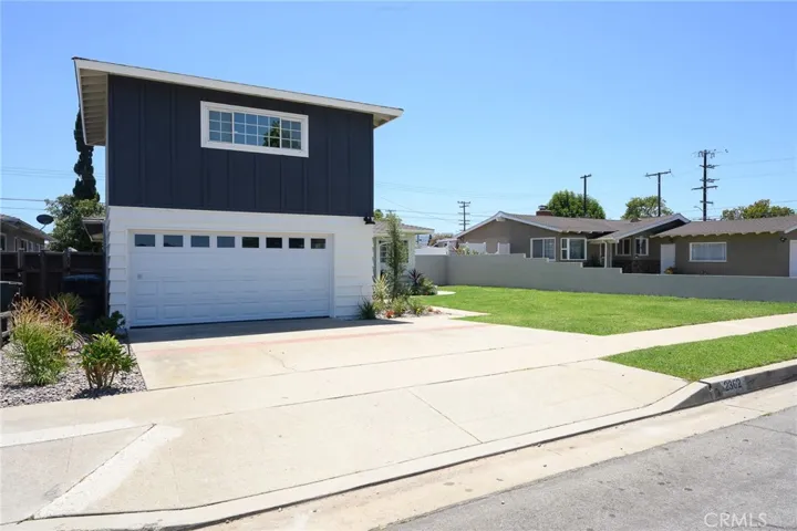 This home has an inviting curb appeal featuring gorgeous new landscaping