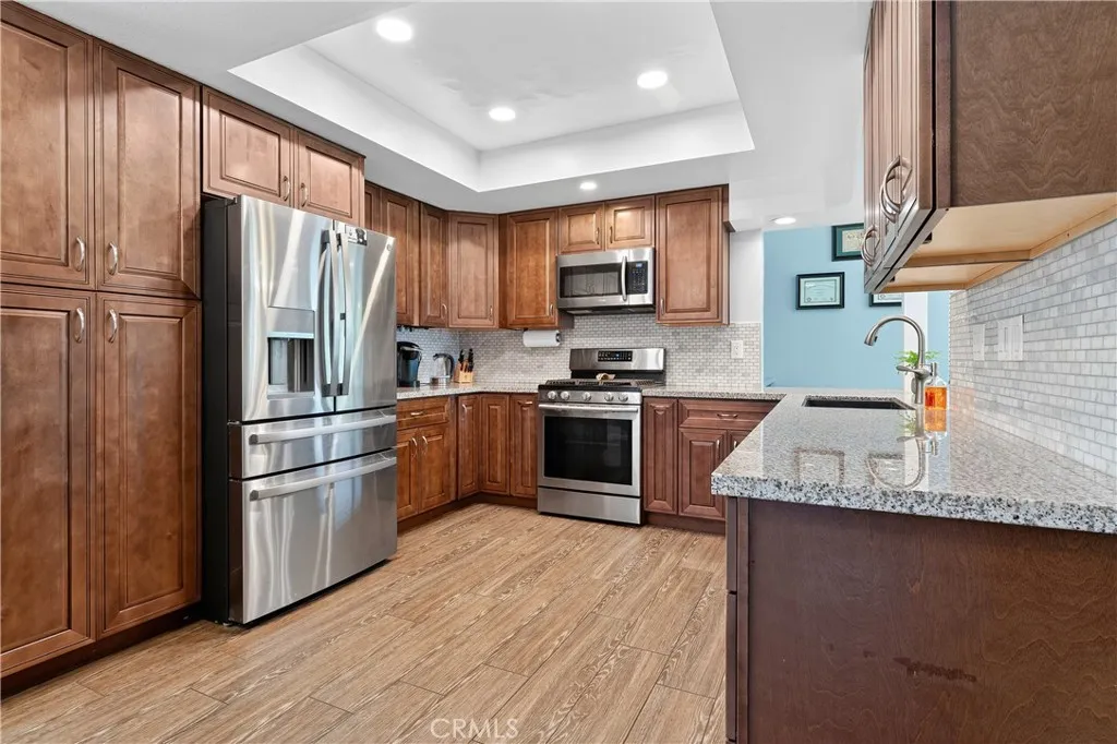 Modern Kitchen with soft close cabinets and stainless steel appliances