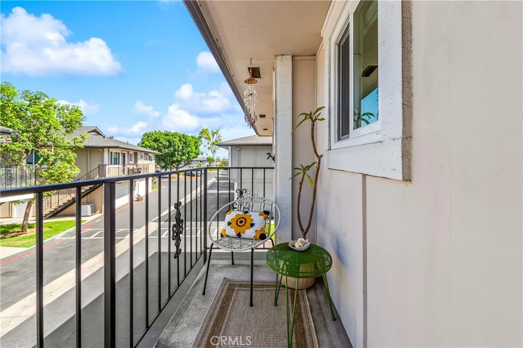 Balcony stretches the front of the unit with space for sitting area or BBQ.