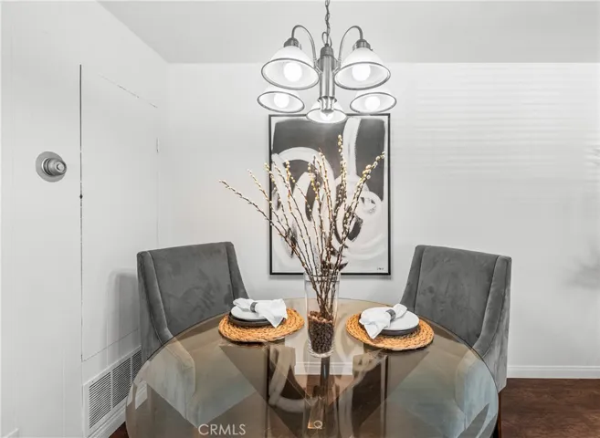 Large dining area-set for two but could easily accommodate a rectangular table. Dinner for six?