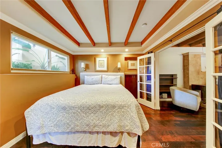 Primary bedroom with French doors