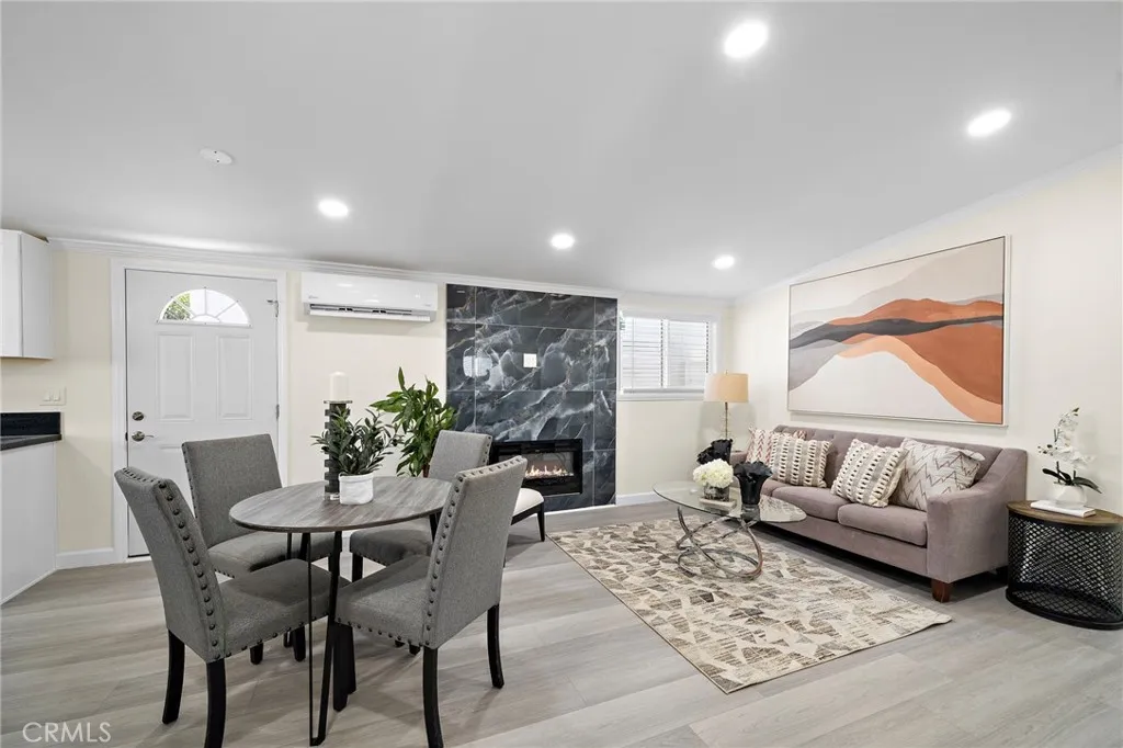 Everything is New New New - Vinyl Flooring, Crown Molding, Recessed Lighting, Dual Pane Windows, Marble-Like Electric Fireplace, Ductless Air Conditioning