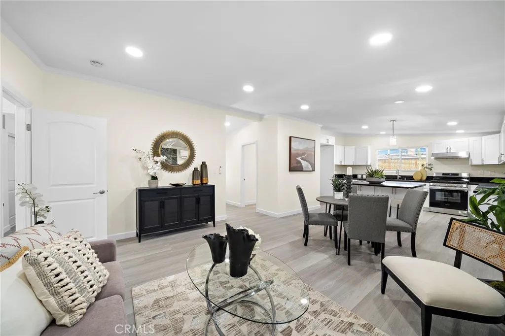 Vaulted Ceilings, Crown Molding, Recessed Lighting, Wide Plank Vinyl Flooring, New Paint, High Baseboards