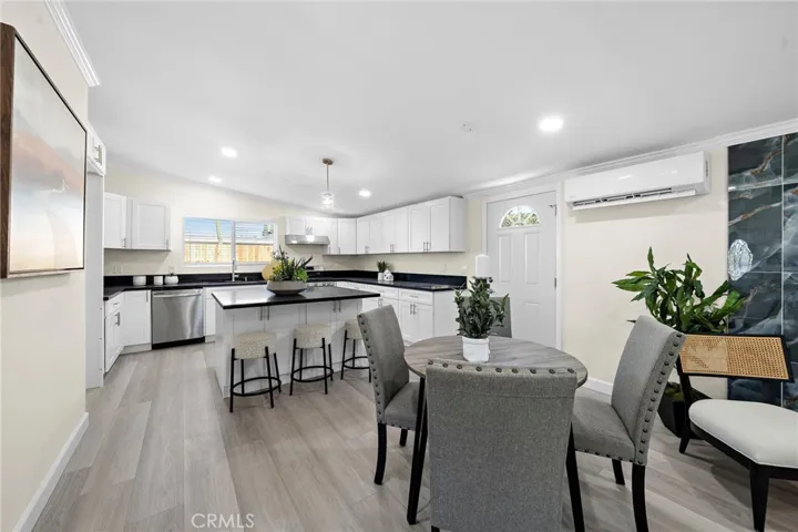 Granite Kitchen with Center Island, Stainless Appliances, and Custom Self-Closing Cabinetry