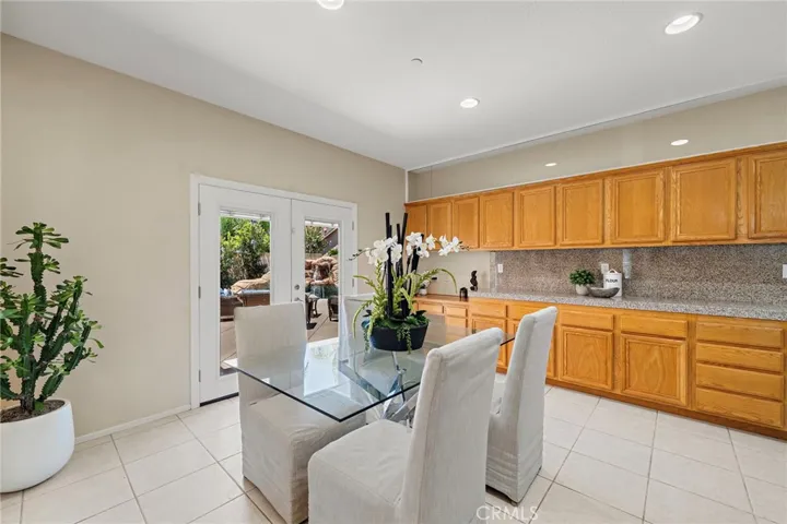 Direct access to the backyard with double doors
