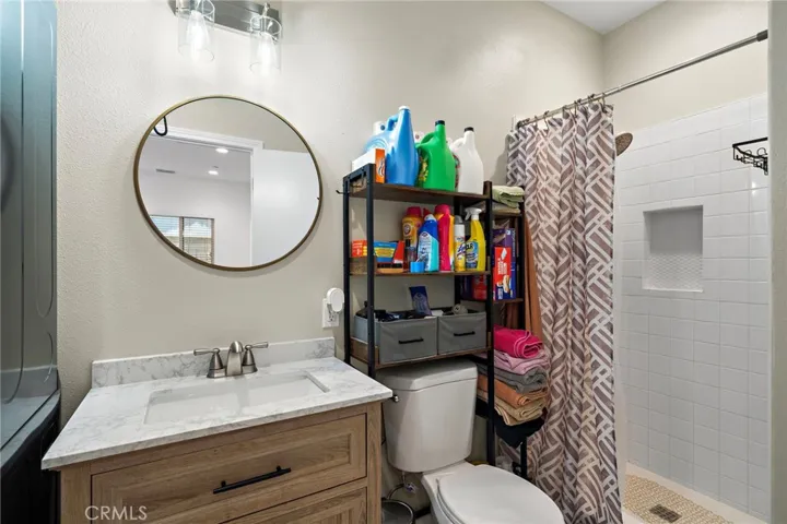 1 of 2 bathrooms with walk in shower