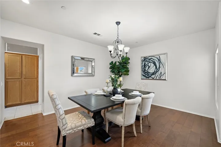 Formal dining room has entrance to kitchen