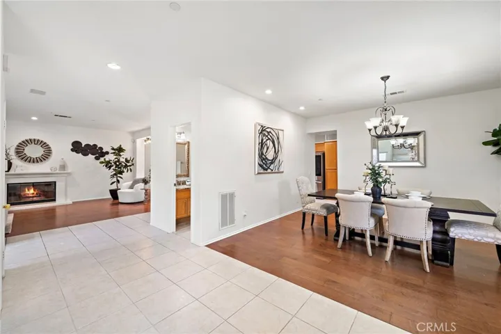Formal dining room with recessed lighting and chandelier