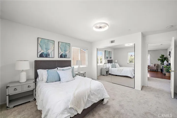 1 of 4 bedrooms up stairs with mirrored closet