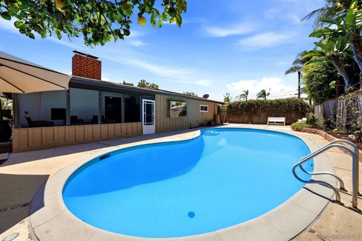 Pool with shade from lemon tree.