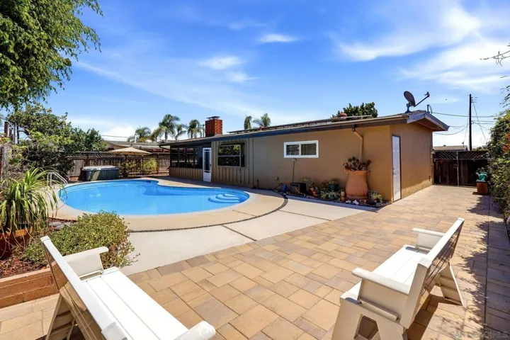 Backyard are to entertain. Outlet in back corner.