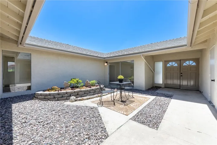 Private courtyard entry easily feels like you're in Palm Springs.