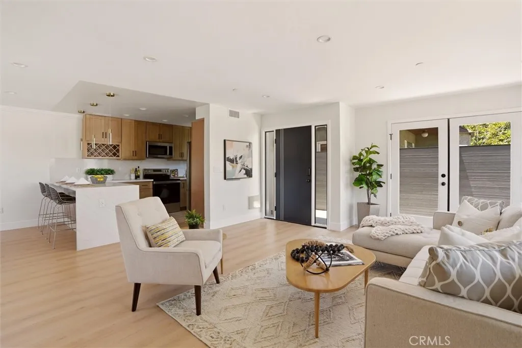 Kitchen opens to main living room, right off main entrance