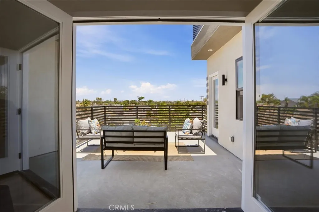 Second level balcony entrance from second level living space