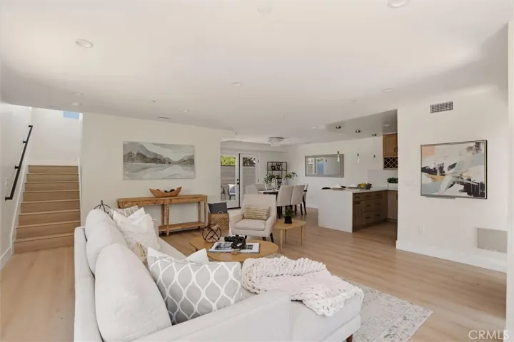 View into dining area and kitchen from main living area