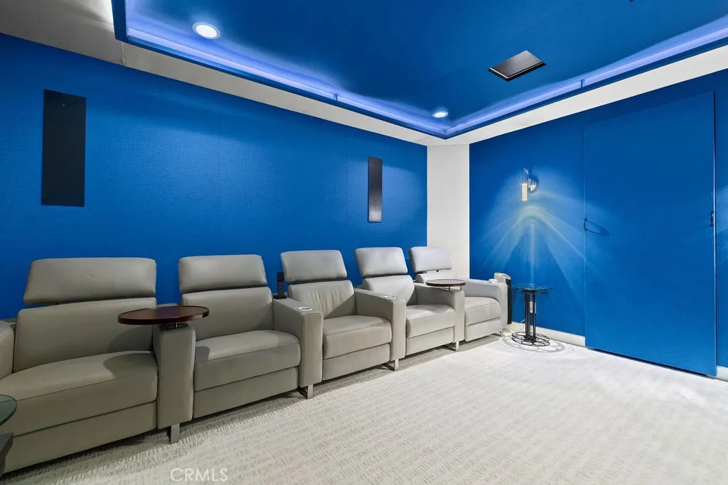Wall panels for sound proofing are on a track system and removable to restore room to its original condition