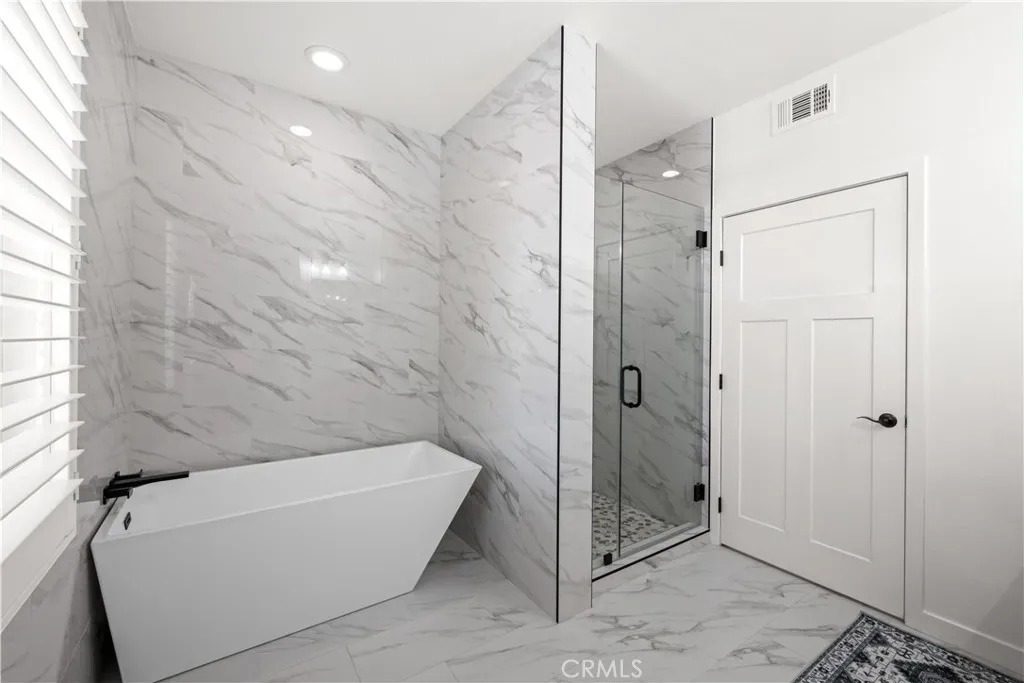Floor-to-Ceiling Tile & Soaking Tub