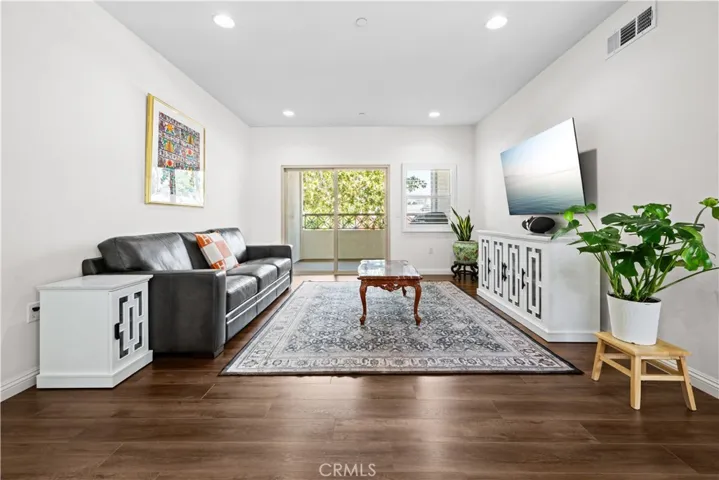 Living Room w/ Balcony Acess