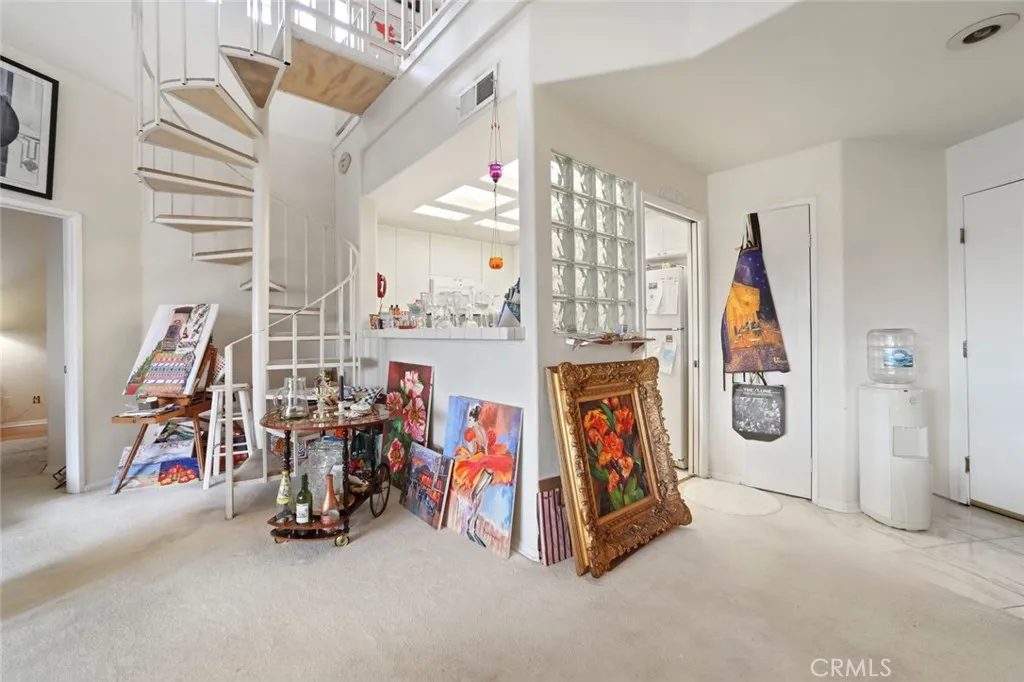 Spiral stairs lead to LOFT