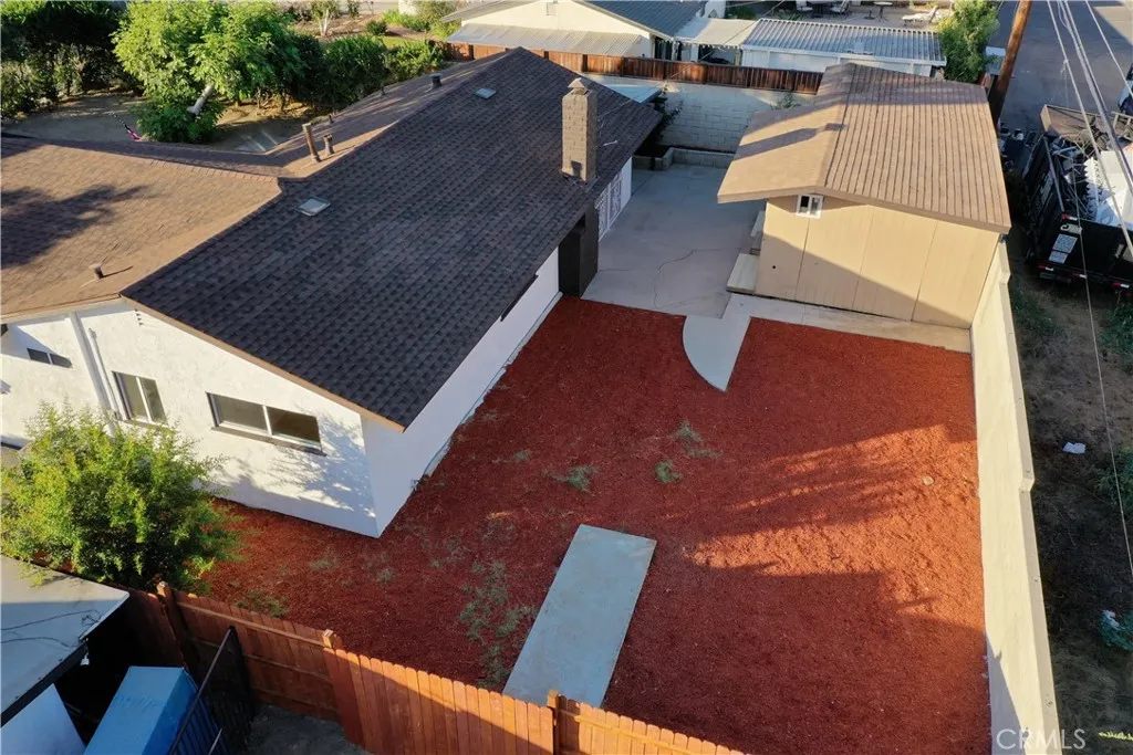 Take in the spacious backyard from above and appreciate the privacy, new wood fence, and generous outdoor space. Take in the spacious backyard from above and appreciate the privacy, new wood fence, and generous outdoor space.
