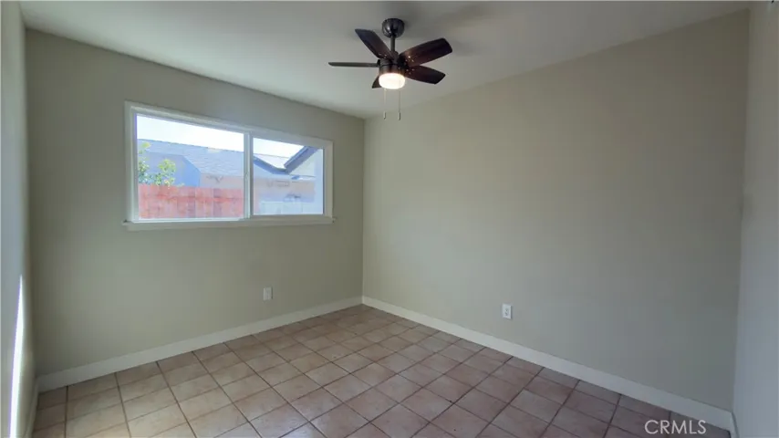 FIRST BEDROOM NEW PAINT AND CIELING FAN.